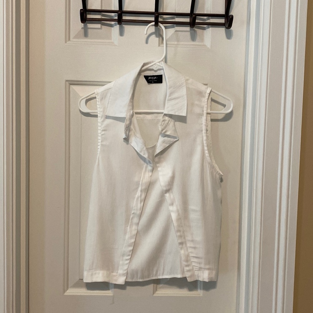 Sleeveless white top